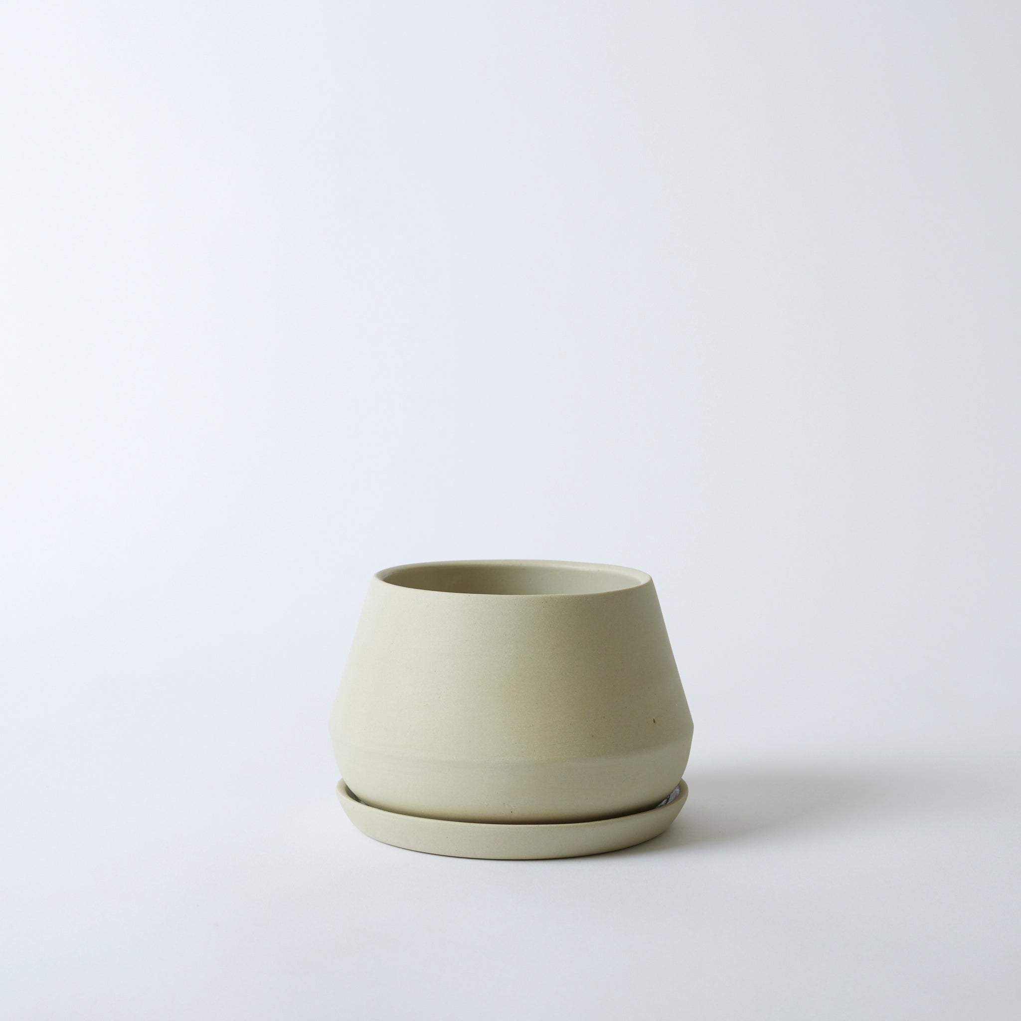 Silo image of a sand colored 6" Rancho Planter. It is a beautiful off-white, cream color.