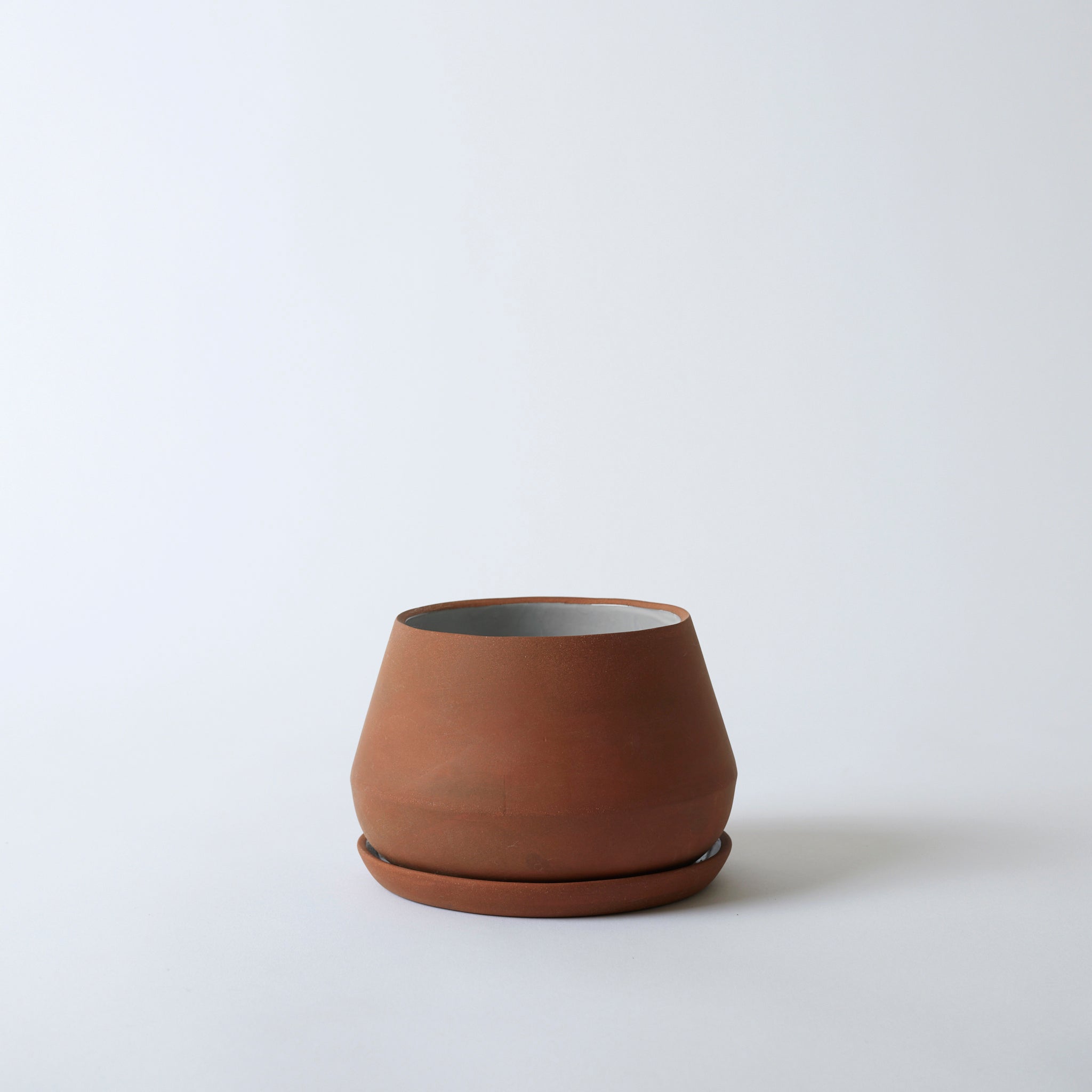 Silo image of the 6" terra cotta Rancho Planter. It is a beautiful natural clay color.