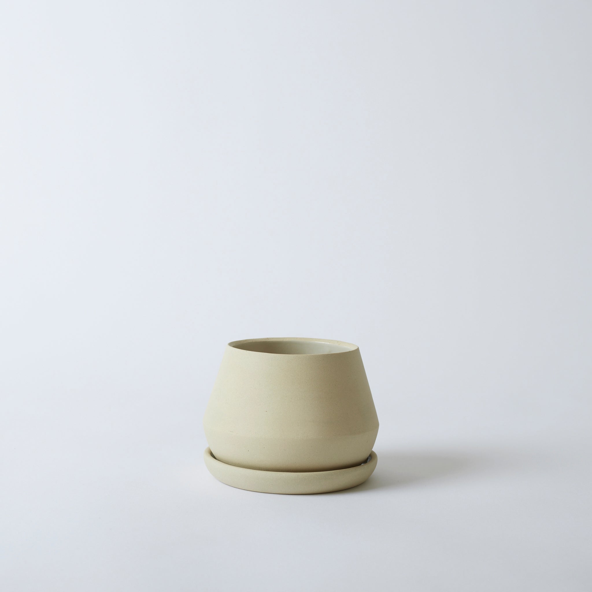 Silo image of a sand colored 5" Rancho Planter. It is a beautiful off-white, cream color.