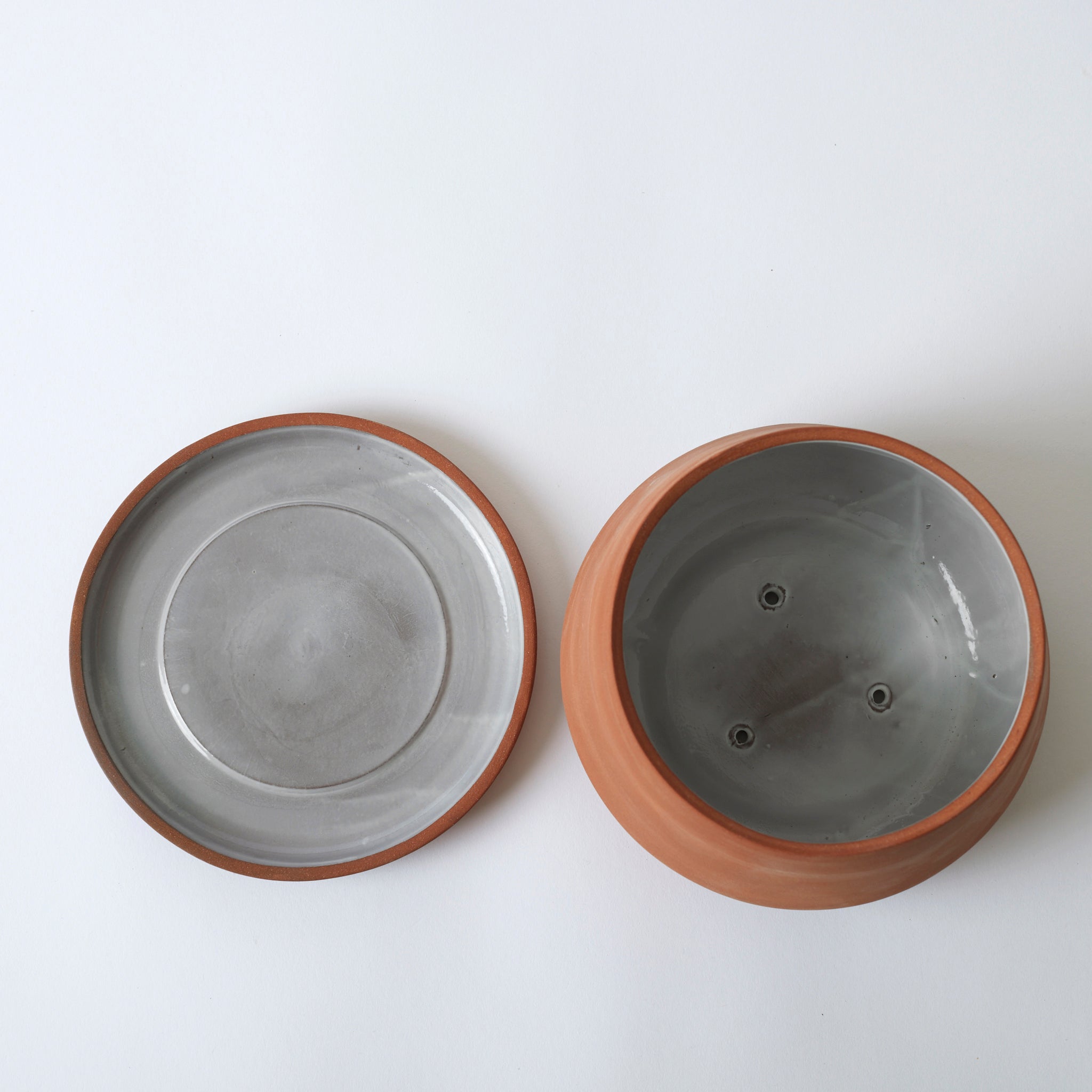 Aerial image of the terra cotta Rancho Planter. The inside of the pot is glazed, so it has a nice shine to it. The planter tray is also glazed on the inside.