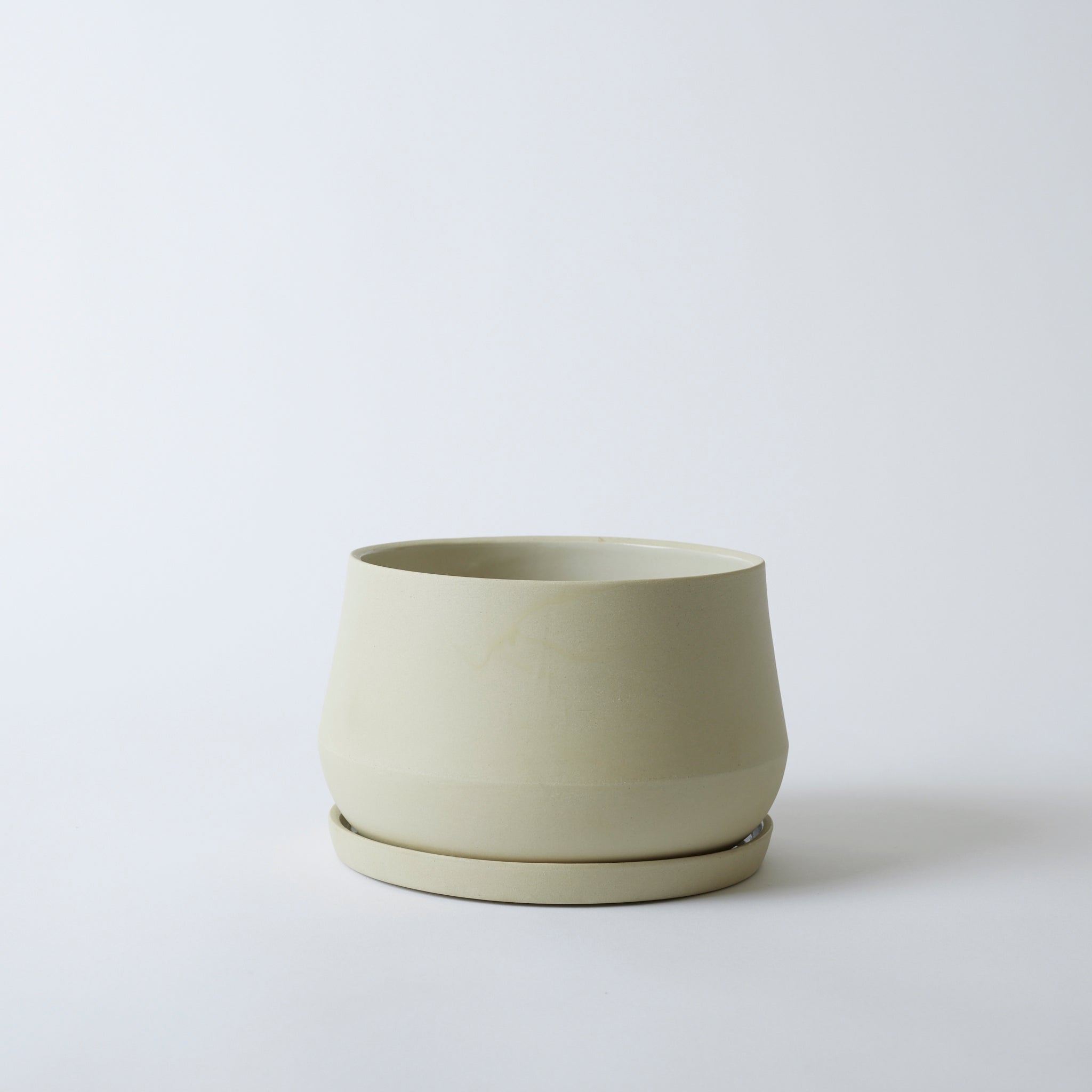 Silo image of a sand colored 8" Rancho Planter. It is a beautiful off-white, cream color.