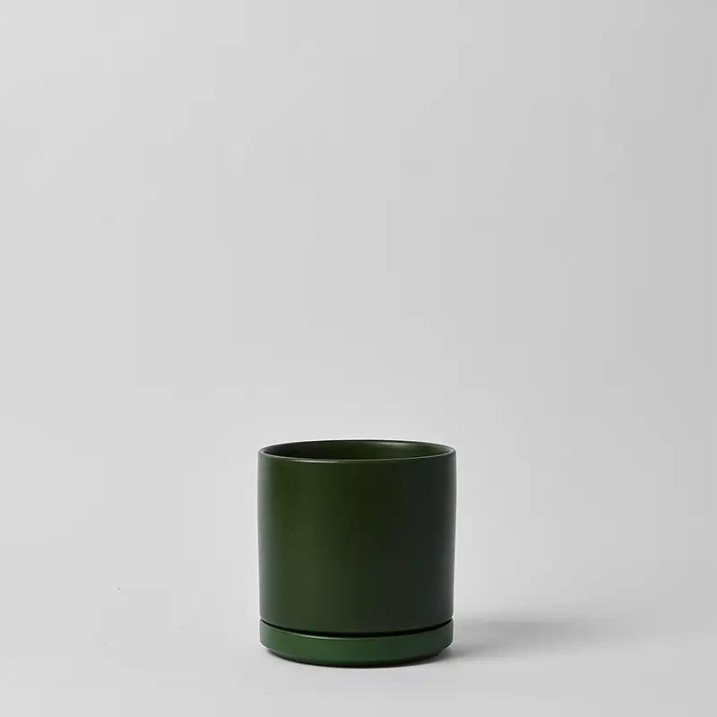 Green 8 Inch cylindrical pot on a light gray background