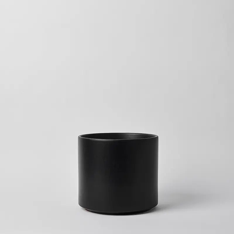 Black 10 Inch cylindrical pot on a light gray background