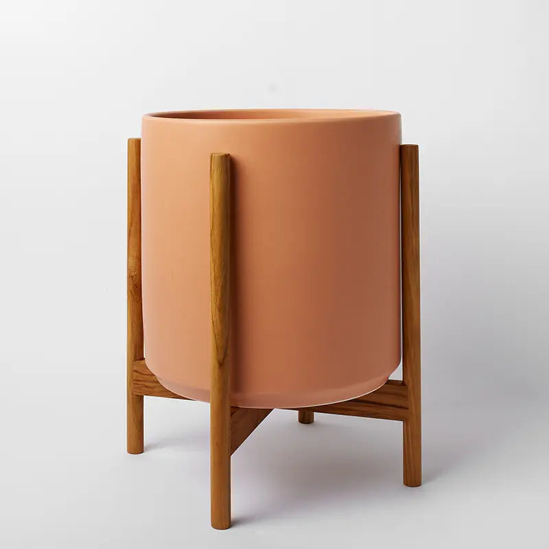 PeachyCotta 14 Inch Ceramic planter with natural rounded stand on a light gray background