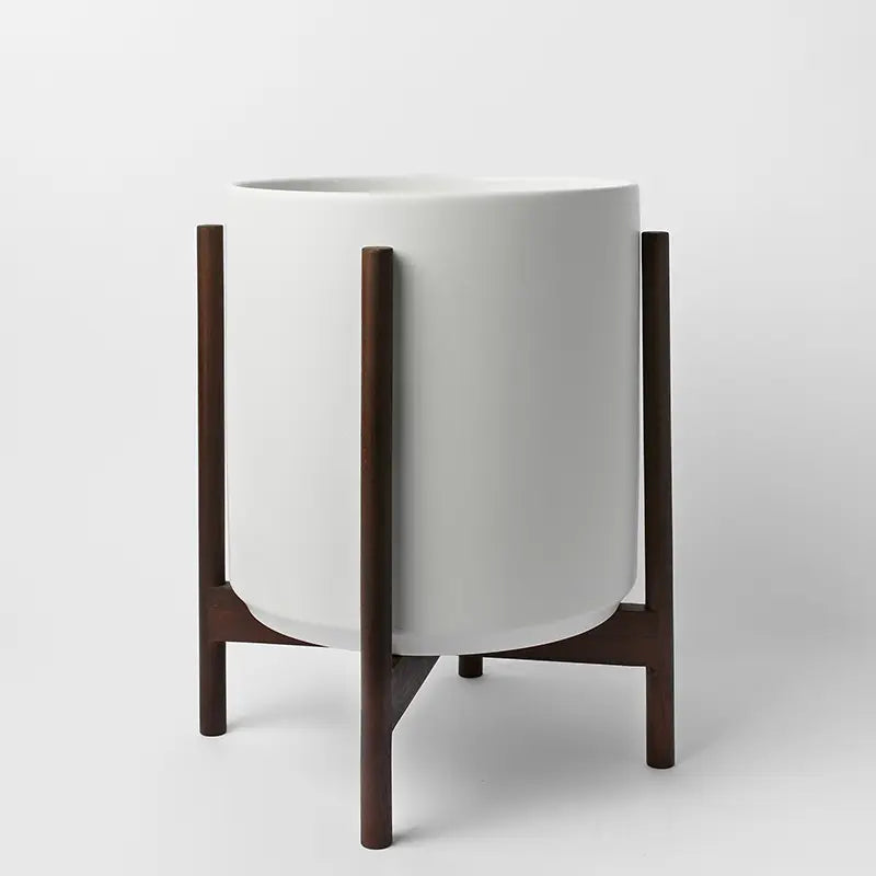 White 14 Inch planter with dark rounded stand on a white background