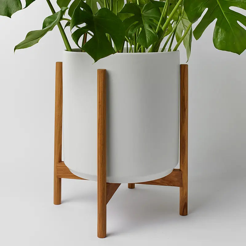 White 14 Inch planter with light rounded stand on a white background