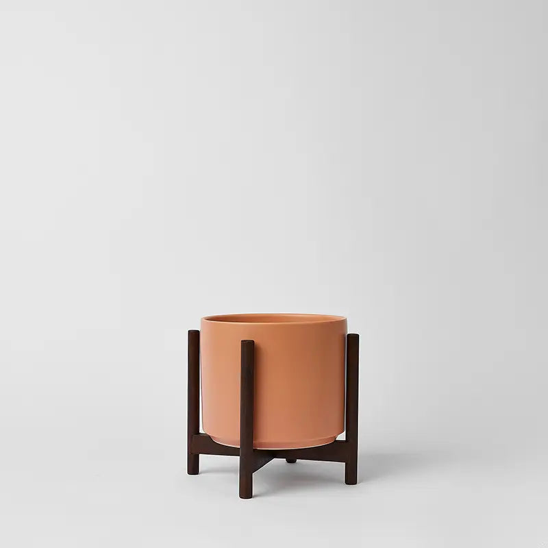 PeachyCotta 6 Inch Ceramic planter with dark rounded stand on a light gray background