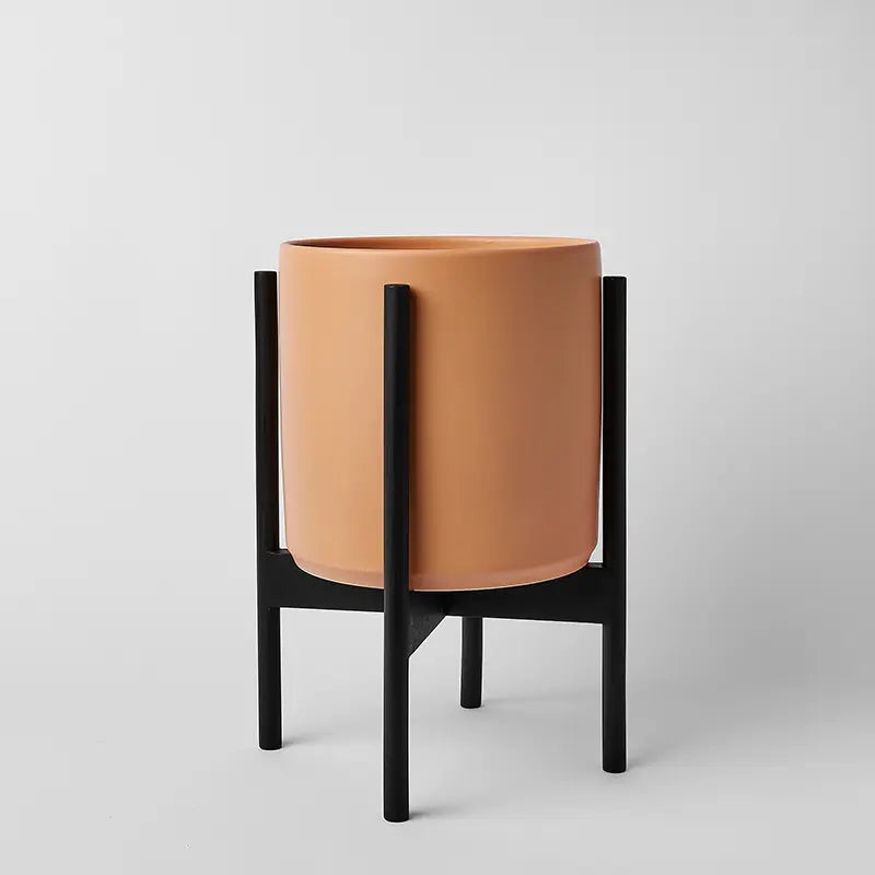 PeachyCotta 10 Inch Ceramic planter with black rounded stand on a light gray background