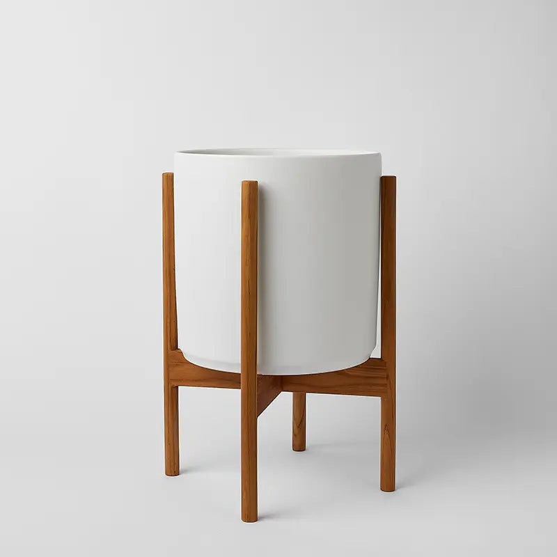 White 10 Inch planter with natural rounded stand on a light gray background