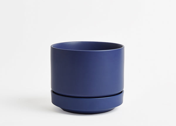 Blue 8 Inch cylindrical planter on a white background