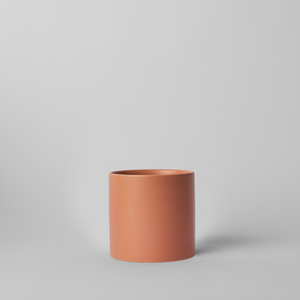 PeachyCotta 4 Inch cylindrical pot on a light gray background