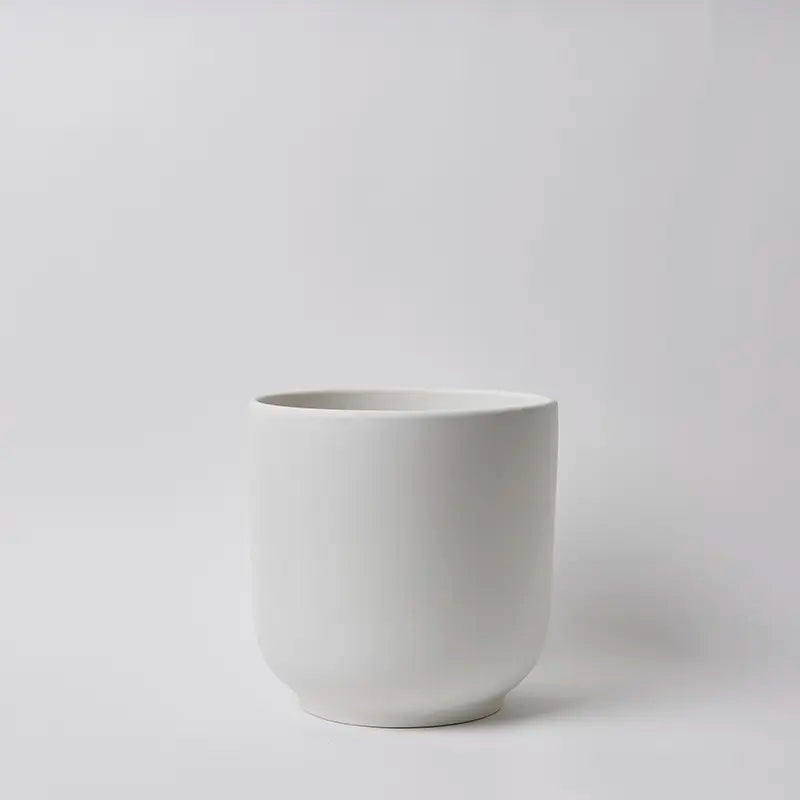 White 10 Inch ceramic cup on a light gray background