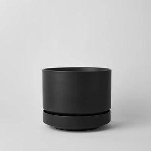 Black 10 inch planter on a light gray background