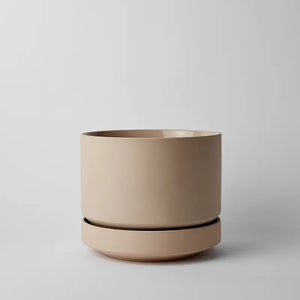 Oatmeal 10 Inch planter on a light gray background