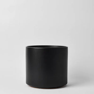 Black 15 Inch cylindrical pot on a light gray background