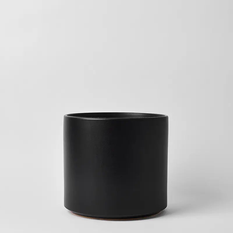 Black 15 Inch cylindrical pot on a light gray background