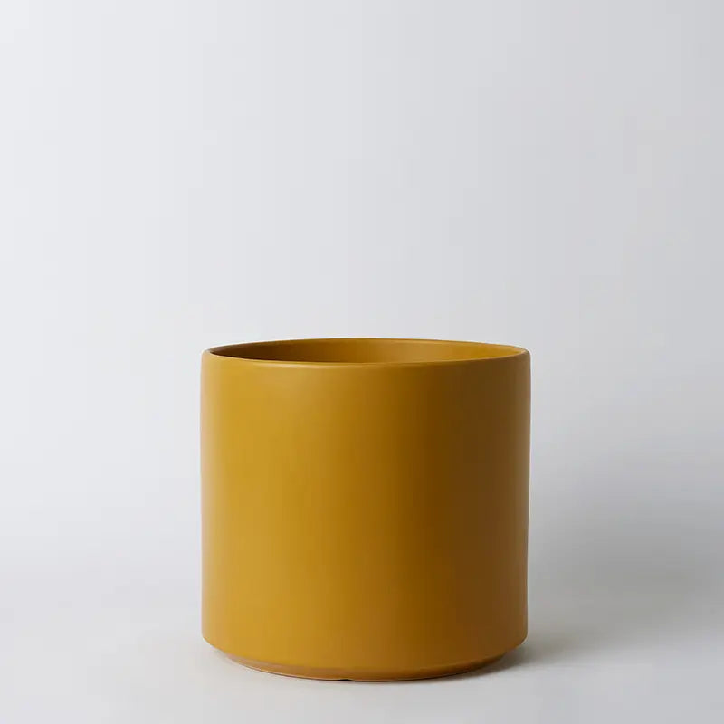 Mustard 15 Inch ceramic pot on a light gray background