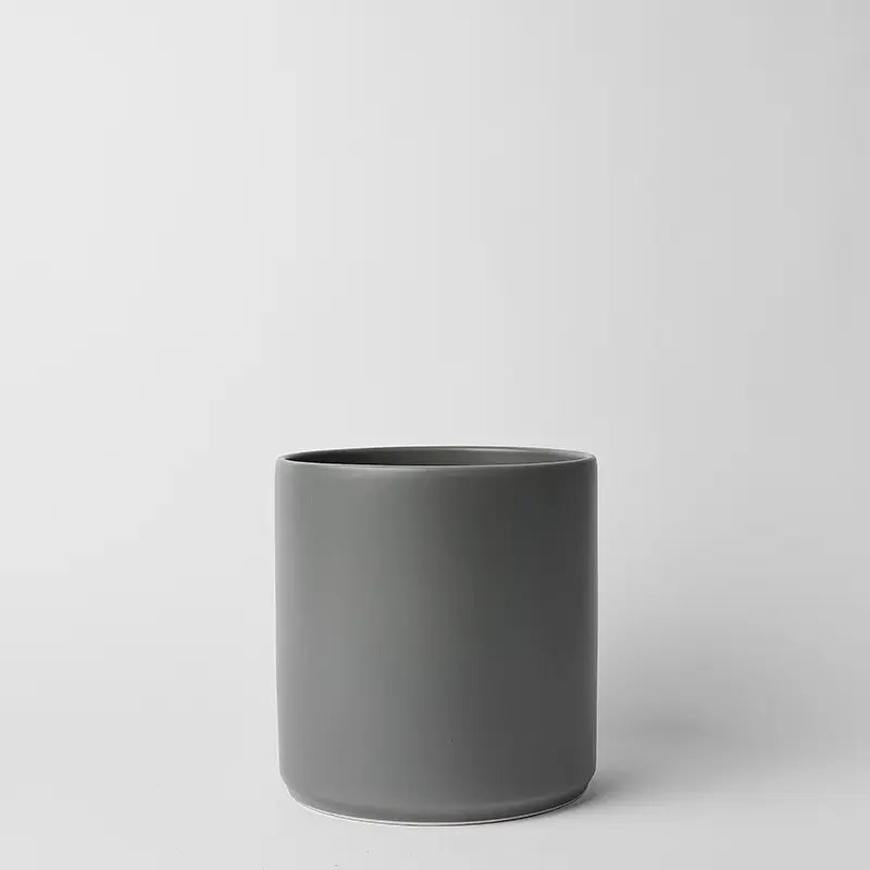 Gray 10 inch ceramic pot on a light gray background