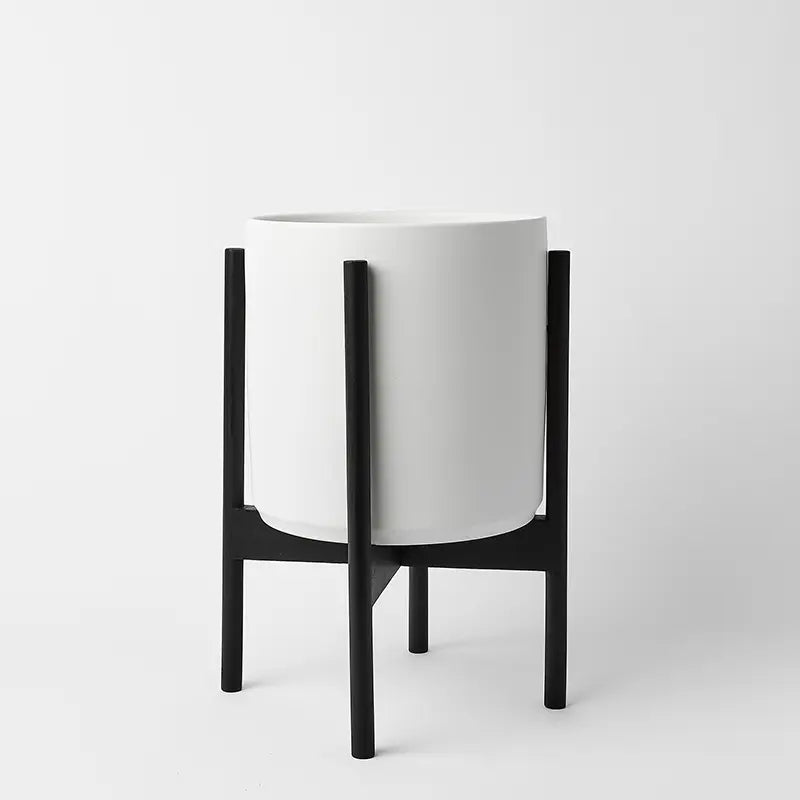 White 10 Inch planter with black rounded stand on a white background