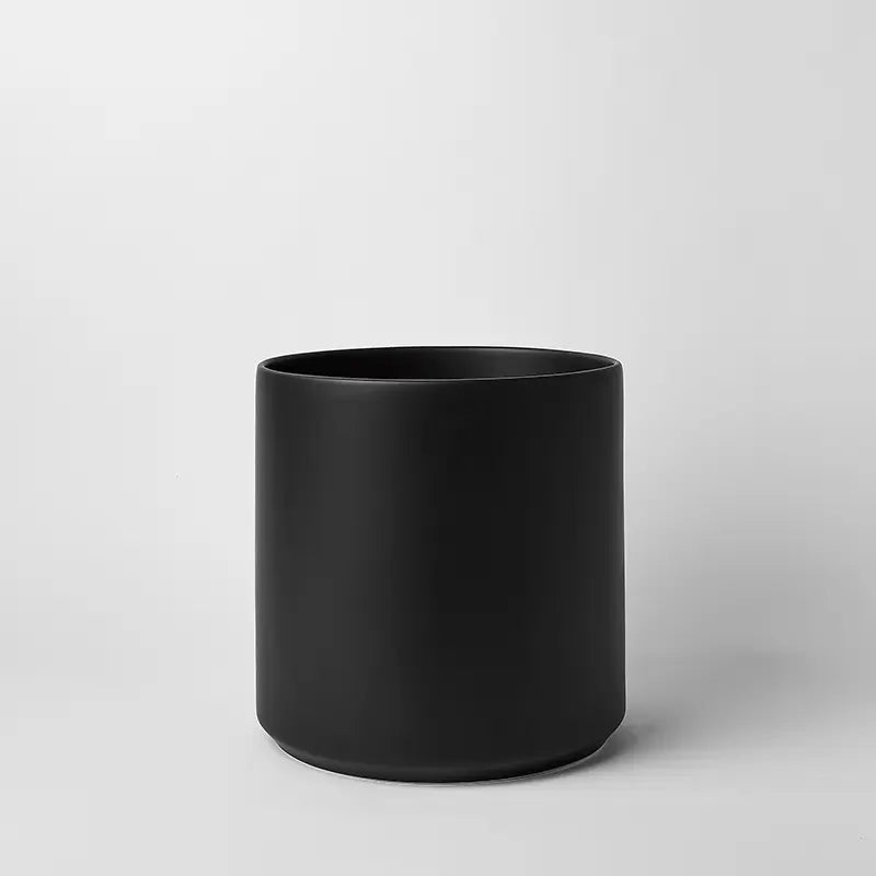 Black 12 Inch cylindrical pot on a light gray background