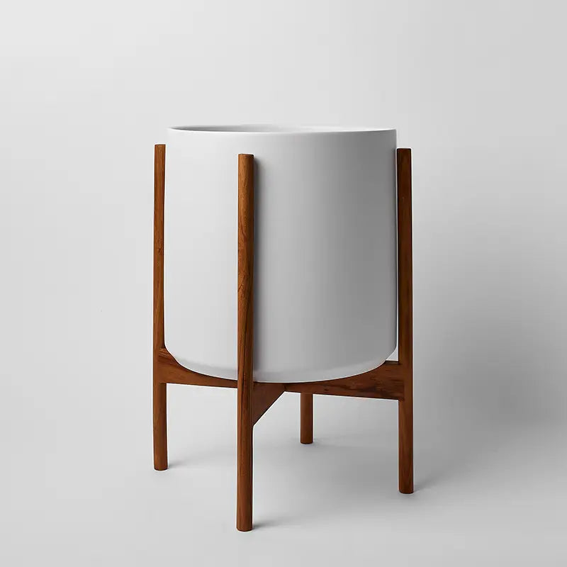 White 12 Inch planter with natural rounded stand on a light gray background